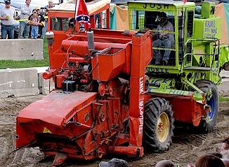 Combines smashing into each other  at the Hillsdale County Fair