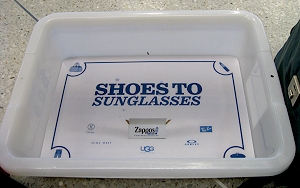 Ad in a TSA bin