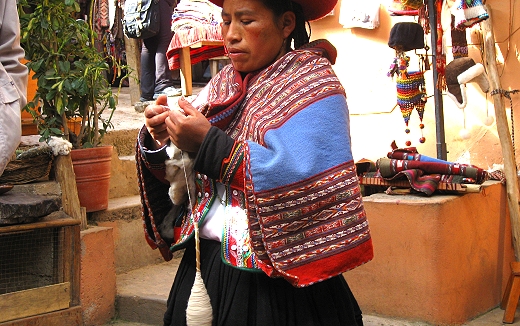 Spinning yarn at the weaving cooperative in Chincheros, Peru