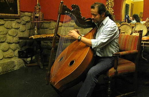 Gustavo plays a harp in Cusco Peru