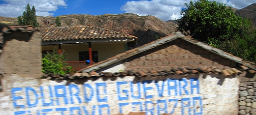 Many homes sport advertising on the outer walls facing the road. Signs for politicians seem to be most prevalent.
